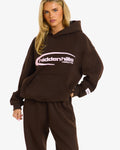 Hidden Hills Sporty Hoodie Dark Brown/Light Pink, front view with hand in pocket