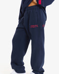 Hidden Hills Vintage Logo Straight Leg Sweatpants Navy/Raspberry Red, side view with Hidden Hills Los Angeles print