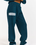 Hidden Hills Gated Community Straight Leg Sweatpants Deep Teal, side view with HIDDEN leg print