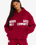 Hidden Hills Gated Community Hoodie Burgundy, front view with hands in pocket