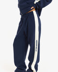 Hidden Hills Contrast Panel Straight Leg Sweatpants navy with cream side stripe, three-quarter view