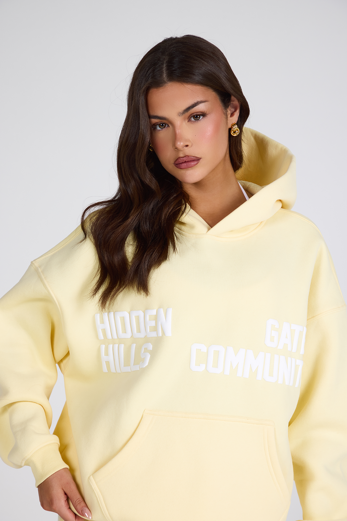 GATED COMMUNITY HOODIE BUTTERGELB